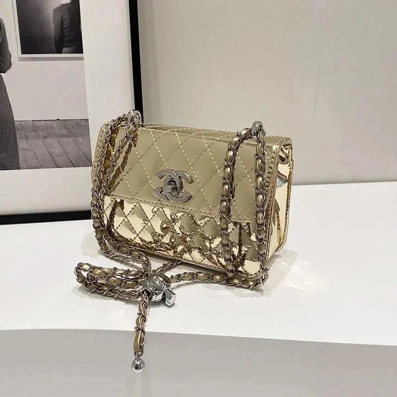 A RARE, METALLIC SILVER METAL AND LEATHER MINI SQUARE FLAP BAG