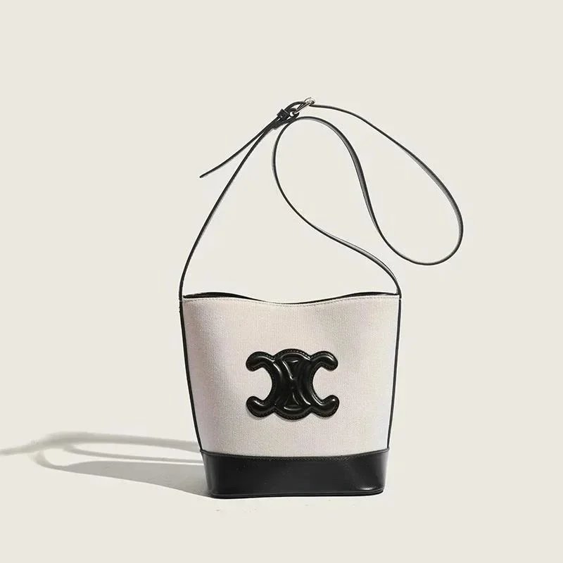 SMALL BUCKET CUIR TRIOMPHE IN TEXTILE AND CALFSKIN